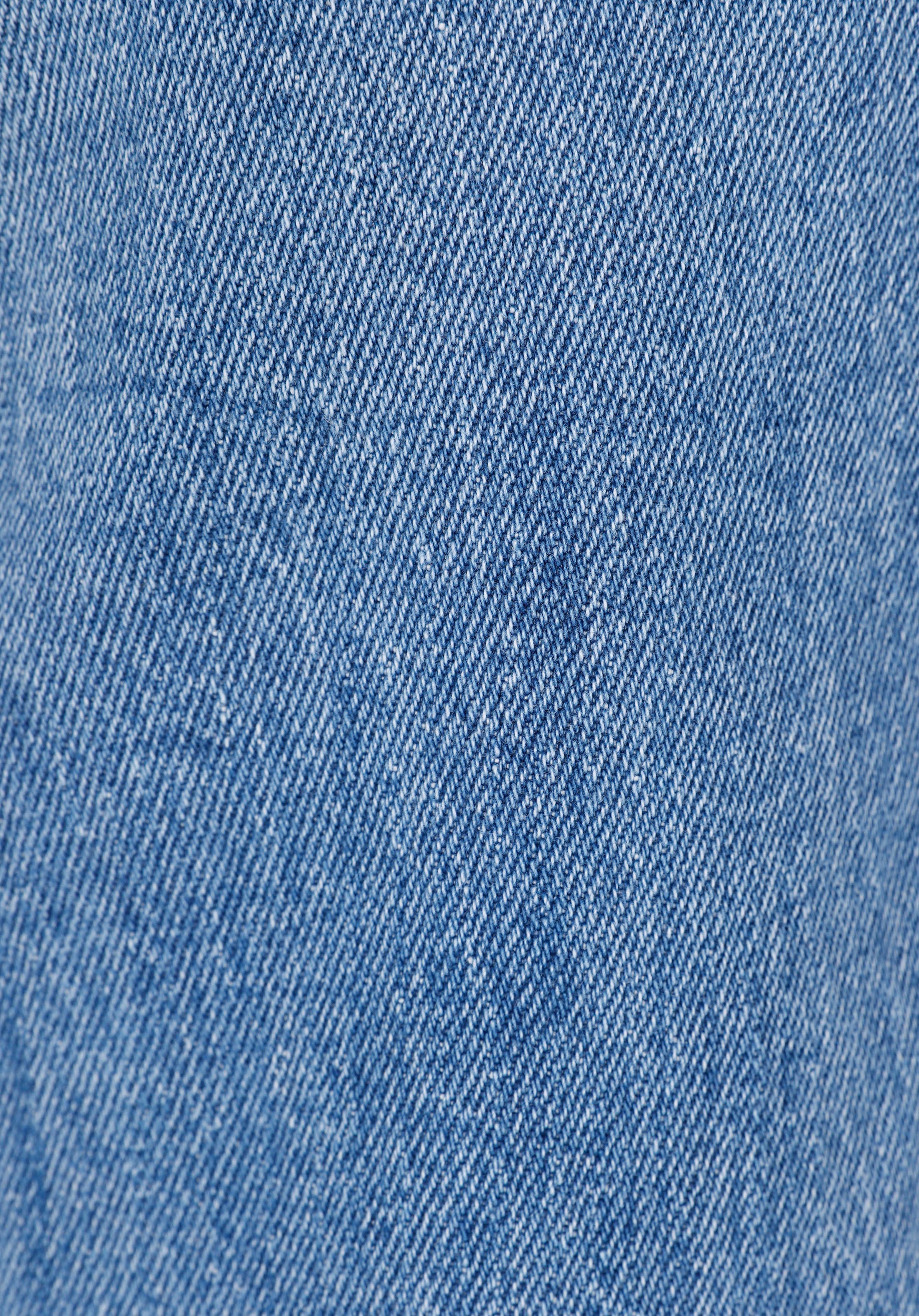 Slim Fit Orta Bel Daralan Paça Kadın İndigo Jean Pantolon