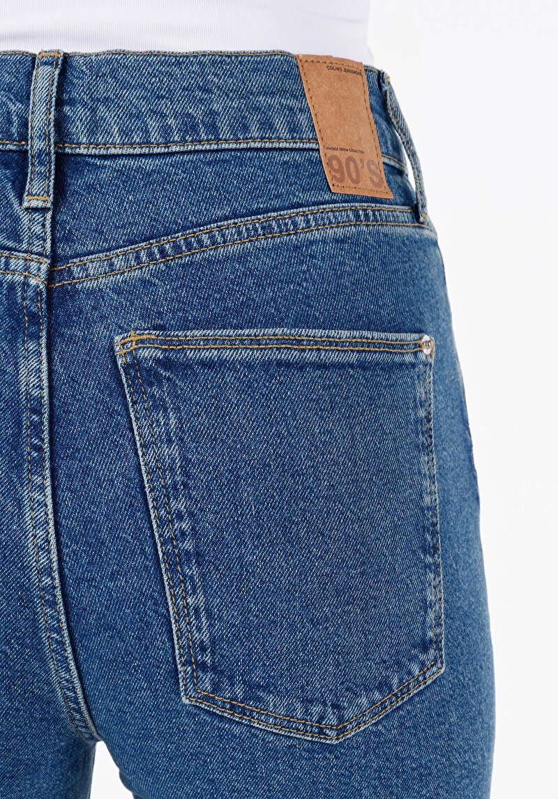 Regular Fit Yüksek Bel Yırtmaçlı Paça Kadın İndigo Jean Pantolon