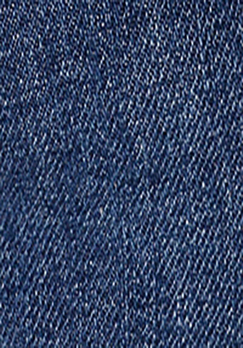 Skinny Fit Orta Bel Dar Paça Cepli Kadın İndigo Jean Pantolon