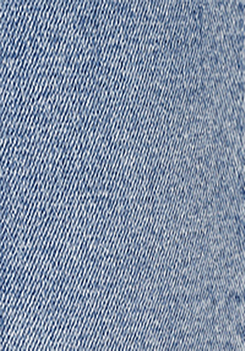 Mom Fit Yüksek Bel Daralan Paça Kadın İndigo Jean Pantolon