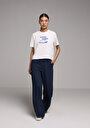 regular-fit-yuksel-bel-genis-paca-kadin-lacivert-pantolon