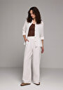 regular-fit-yuksel-bel-genis-paca-kadin-beyaz-pantolon