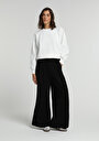regular-fit-yuksel-bel-genis-paca-kadin-siyah-pantolon