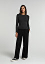 regular-fit-yuksel-bel-genis-paca-kadin-siyah-pantolon