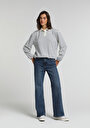 loose-bootcut-fit-kadin-mid-indigo-denim-jean-pantolon